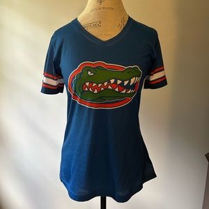 NWT women’s size medium Florida Gator jersey style top